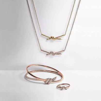 Luminous Pavé Knot Necklace-Necklaces-Blizzm